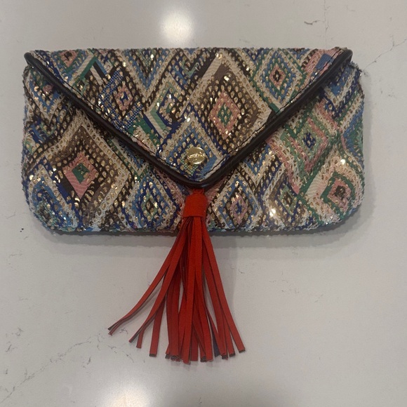 Anthropologie Handbags - Anthropologie Multicolor Sequin Clutch with Red Tassel